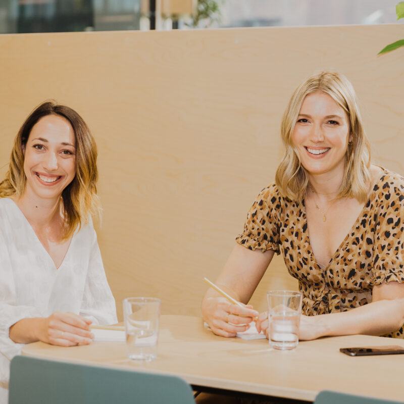 Two ladies smiling